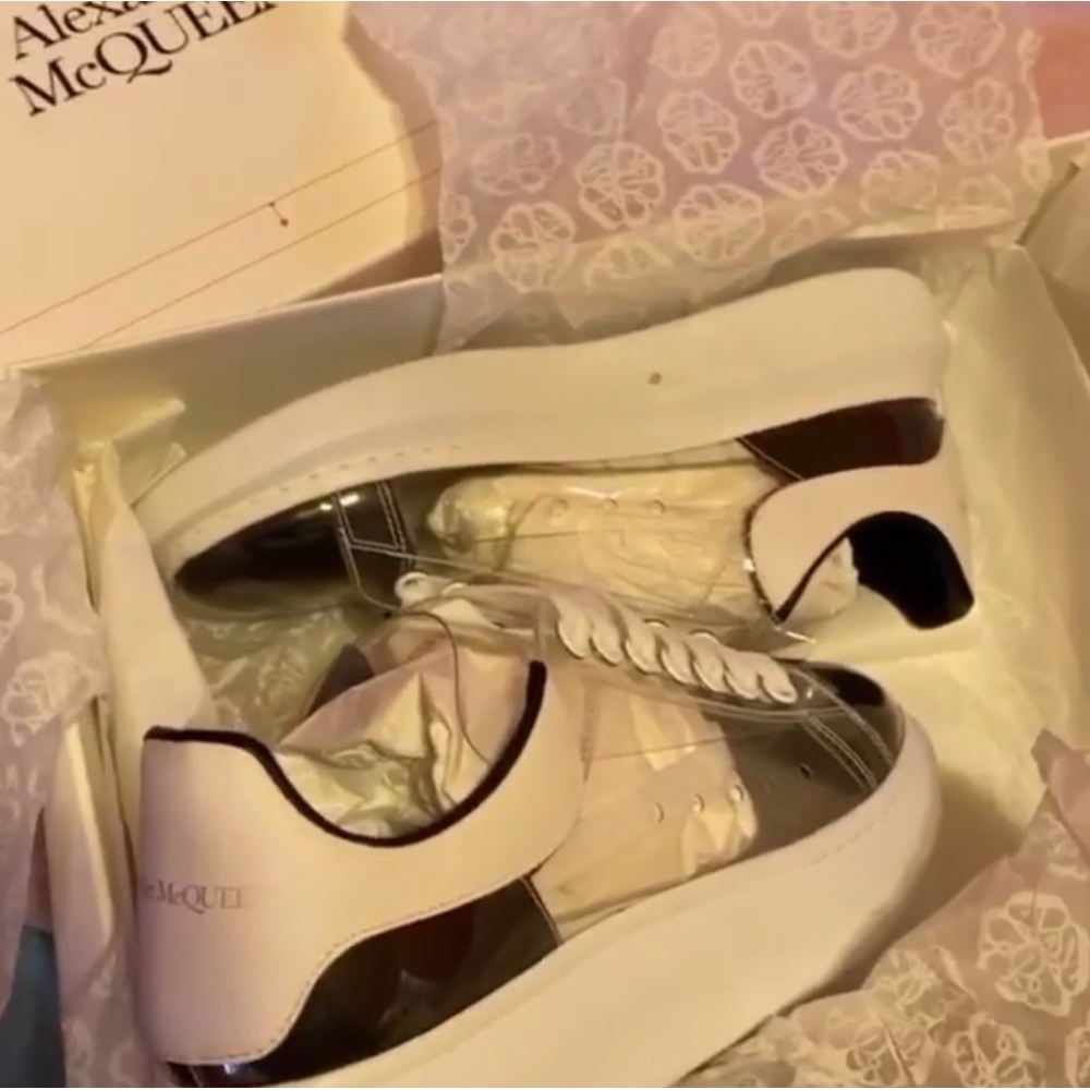 Alexander McQueen clear, black and white sneaker. Very different
